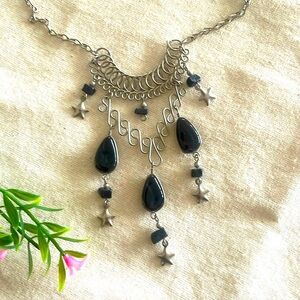 Vintage necklace w/ black stones and stars.